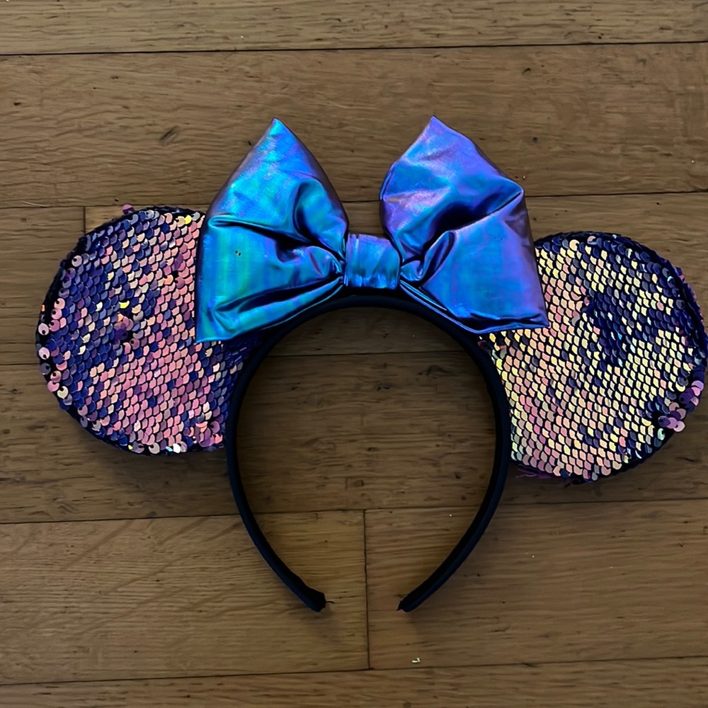 Iridescent blue, mini ears with sequence.